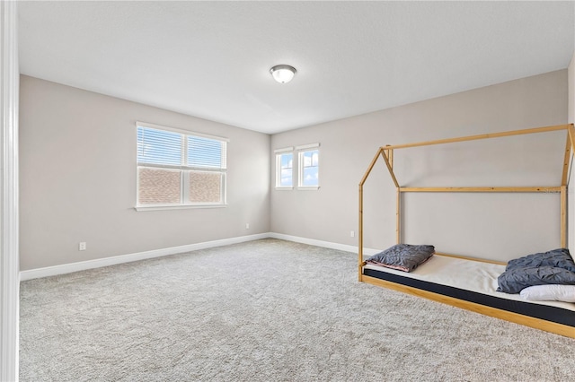 16013 Silver Brook Way, Winter Garden, FL 34787 - unfurnished bedroom with baseboards and carpet floors