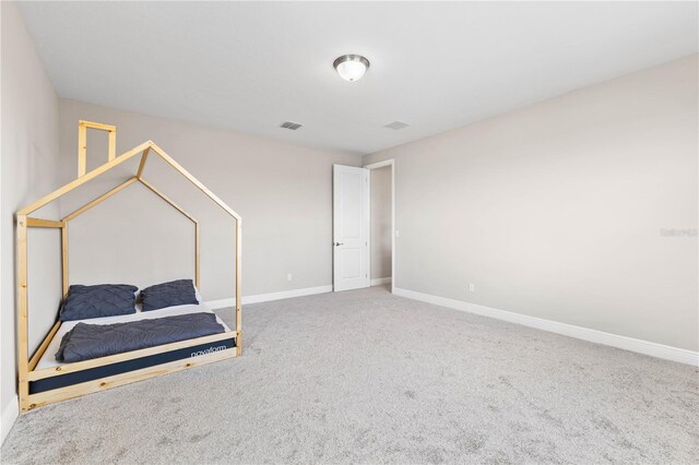 16013 Silver Brook Way, Winter Garden, FL 34787 - bedroom with baseboards and carpet