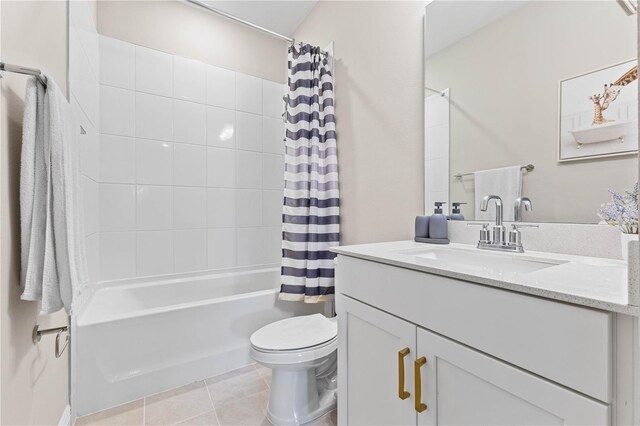16013 Silver Brook Way, Winter Garden, FL 34787 - bathroom featuring toilet, shower / bathtub combination with curtain, tile patterned floors, and vanity