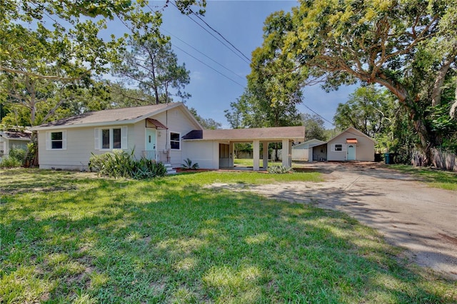 222 E Atwater Ave, Eustis, FL 32726 - ranch-style house with driveway and a front lawn