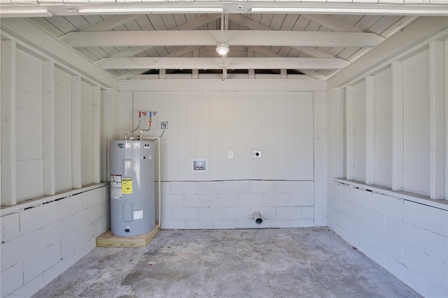 222 E Atwater Ave, Eustis, FL 32726 - garage with water heater and concrete block wall