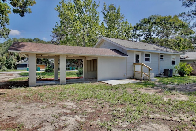 222 E Atwater Ave, Eustis, FL 32726 - rear view of house with central air condition unit