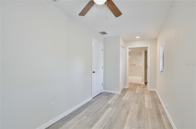 222 E Atwater Ave, Eustis, FL 32726 - spare room with light wood-style flooring, baseboards, and a ceiling fan
