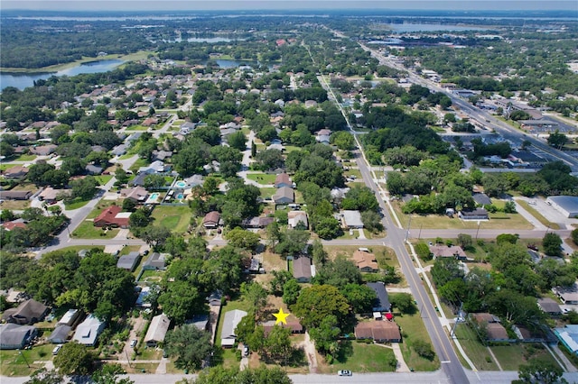 222 E Atwater Ave, Eustis, FL 32726 - aerial view of property and surrounding area with a large body of water and nearby suburban area