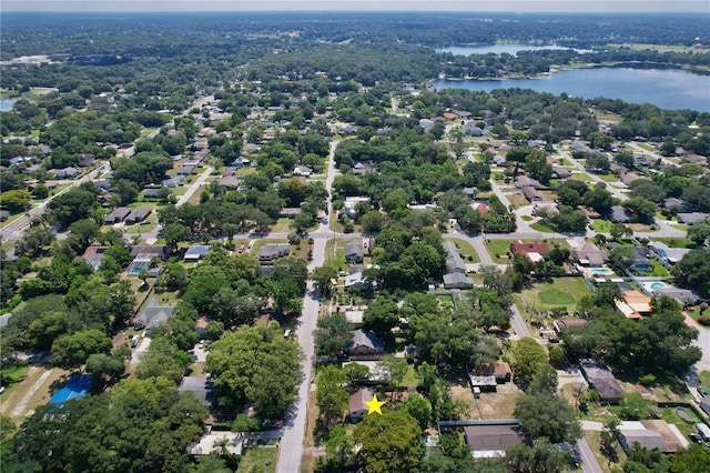 222 E Atwater Ave, Eustis, FL 32726 - aerial overview of property's location featuring a nearby body of water and nearby suburban area
