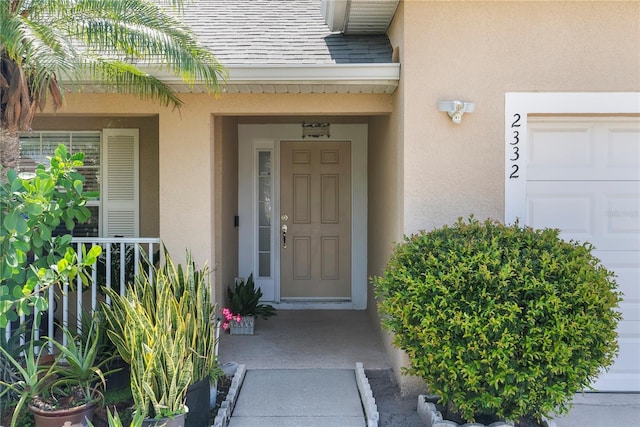2332 Andrews Valley Dr, Kissimmee, FL 34758 - view of exterior entry featuring stucco siding