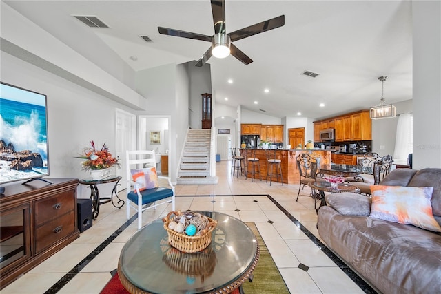2332 Andrews Valley Dr, Kissimmee, FL 34758 - living room featuring inlaid floor details, light tile patterned floors, ceiling fan, recessed lighting, and stairway