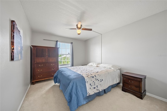 2332 Andrews Valley Dr, Kissimmee, FL 34758 - bedroom with light colored carpet, baseboards, and ceiling fan