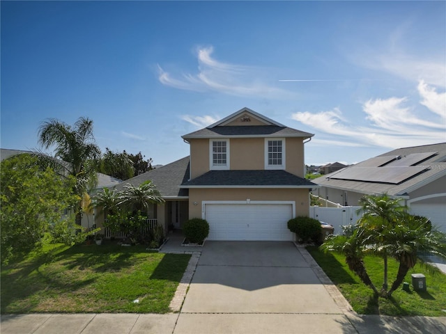 2332 Andrews Valley Dr, Kissimmee, FL 34758 - traditional-style home featuring stucco siding, concrete driveway, an attached garage, and roof with shingles
