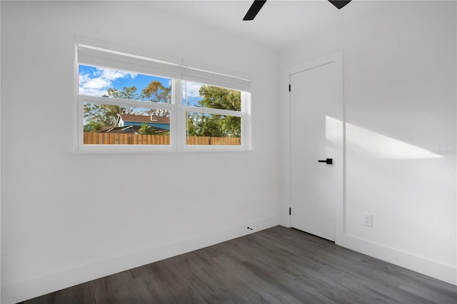 4201 Mizell St, Orlando, FL 32812 - unfurnished room with ceiling fan, dark wood-type flooring, and baseboards