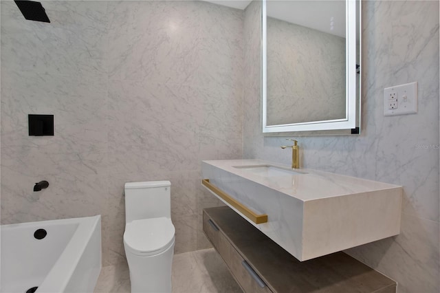 4201 Mizell St, Orlando, FL 32812 - bathroom with toilet, vanity, tile walls, a bathtub, and marble finish flooring