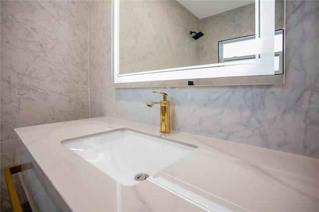 4201 Mizell St, Orlando, FL 32812 - bathroom with tile walls and vanity