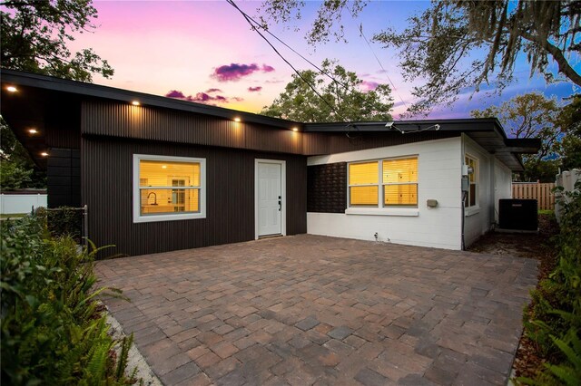 4201 Mizell St, Orlando, FL 32812 - view of front facade featuring a patio and central AC unit
