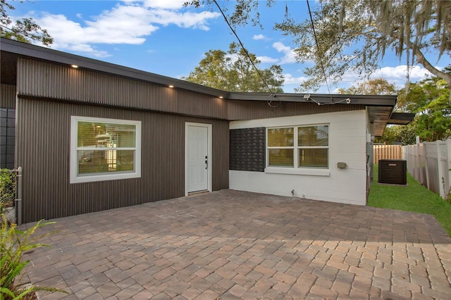 4201 Mizell St, Orlando, FL 32812 - rear view of property featuring a patio area and cooling unit