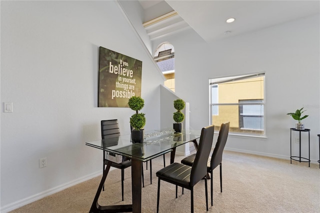 558 Cadiz Loop, Davenport, FL 33837 - carpeted dining space featuring baseboards