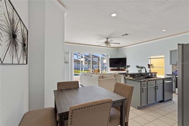 558 Cadiz Loop, Davenport, FL 33837 - dining room featuring a ceiling fan, light tile patterned floors, and recessed lighting