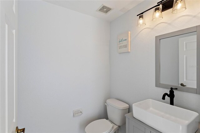 558 Cadiz Loop, Davenport, FL 33837 - bathroom featuring toilet and vanity