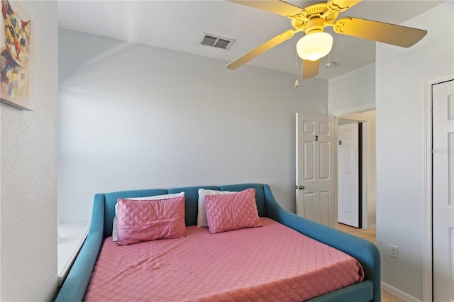 558 Cadiz Loop, Davenport, FL 33837 - bedroom with a ceiling fan and carpet
