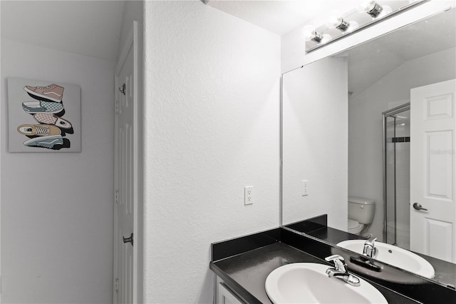 558 Cadiz Loop, Davenport, FL 33837 - bathroom with vanity, toilet, and an enclosed shower