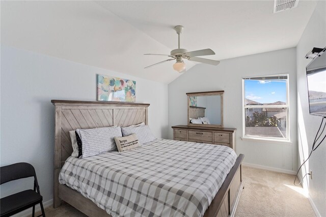 558 Cadiz Loop, Davenport, FL 33837 - bedroom featuring light colored carpet, baseboards, ceiling fan, and vaulted ceiling