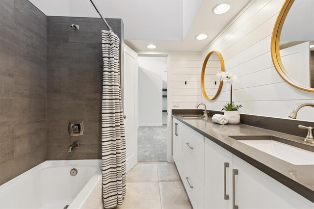 1327 Bridgeport Dr, Winter Park, FL 32789 - full bath with recessed lighting, shower / bath combo with shower curtain, double vanity, and tile patterned flooring
