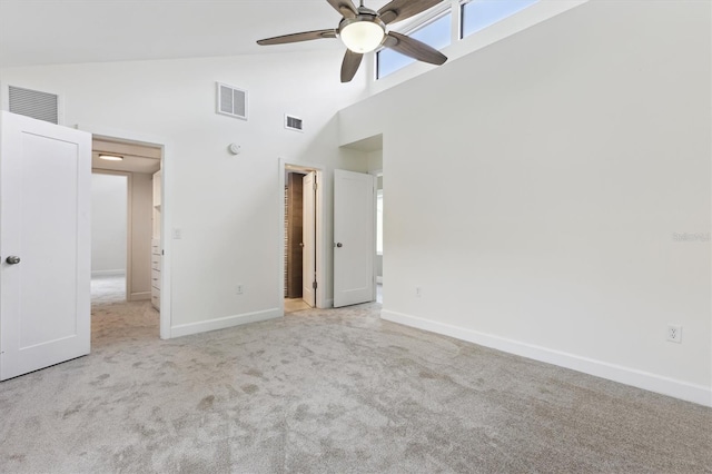 1327 Bridgeport Dr, Winter Park, FL 32789 - unfurnished bedroom featuring high vaulted ceiling, carpet, a spacious closet, and ceiling fan