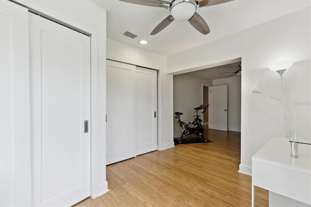 1327 Bridgeport Dr, Winter Park, FL 32789 - bedroom with light wood-style flooring, recessed lighting, ceiling fan, and a closet
