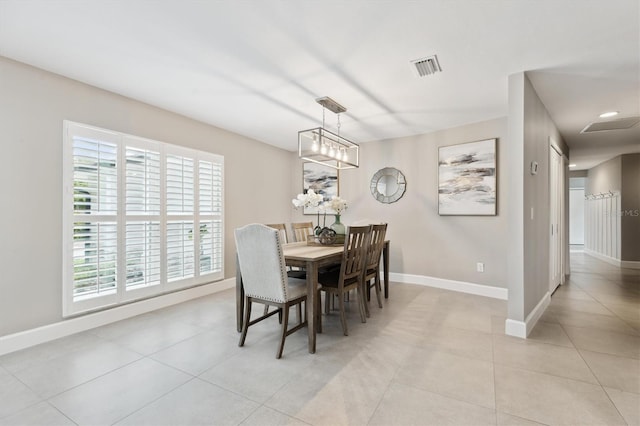 1327 Bridgeport Dr, Winter Park, FL 32789 - dining area with light tile patterned floors and recessed lighting