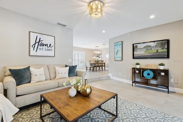 1327 Bridgeport Dr, Winter Park, FL 32789 - living area with a chandelier and recessed lighting
