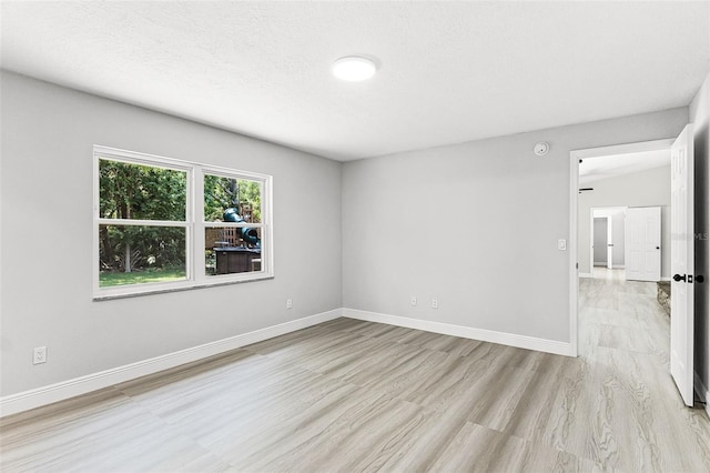 174 Pine Grove Ct, Daytona Beach, FL 32119 - unfurnished room with baseboards and light wood-style floors