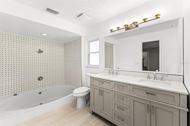 174 Pine Grove Ct, Daytona Beach, FL 32119 - full bathroom with double vanity, toilet, and bathing tub / shower combination