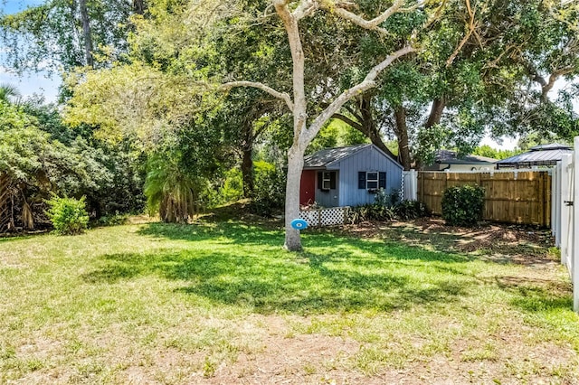 174 Pine Grove Ct, Daytona Beach, FL 32119 - view of yard featuring an outdoor structure