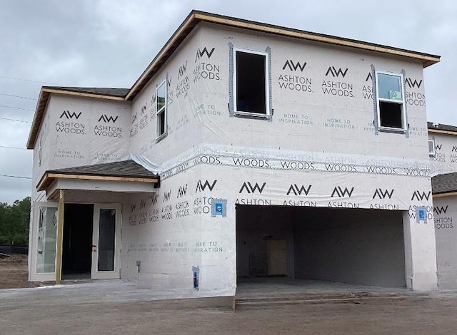 2365 Zuni Rd, Saint Cloud, FL 34771 - view of building exterior featuring a garage