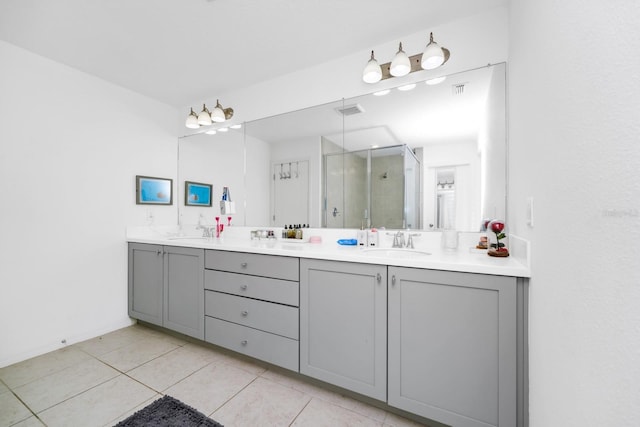 652 Benoi Dr, Davenport, FL 33896 - full bath with double vanity, a shower stall, and tile patterned flooring