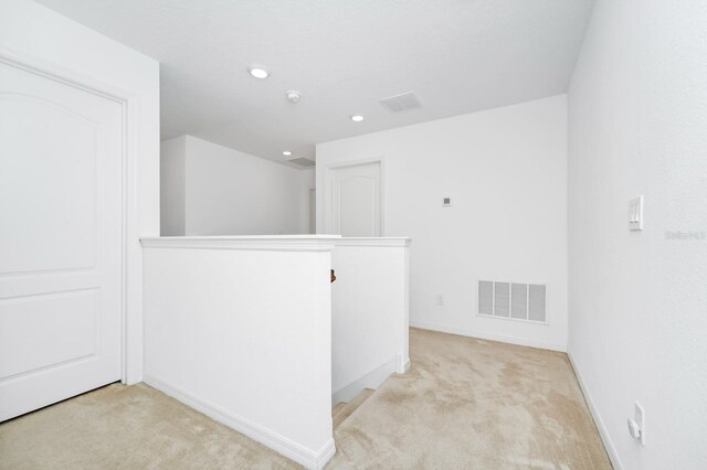 652 Benoi Dr, Davenport, FL 33896 - unfurnished room featuring light colored carpet, recessed lighting, and baseboards