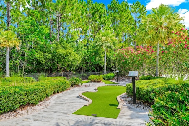 652 Benoi Dr, Davenport, FL 33896 - view of property's community featuring view of wooded area