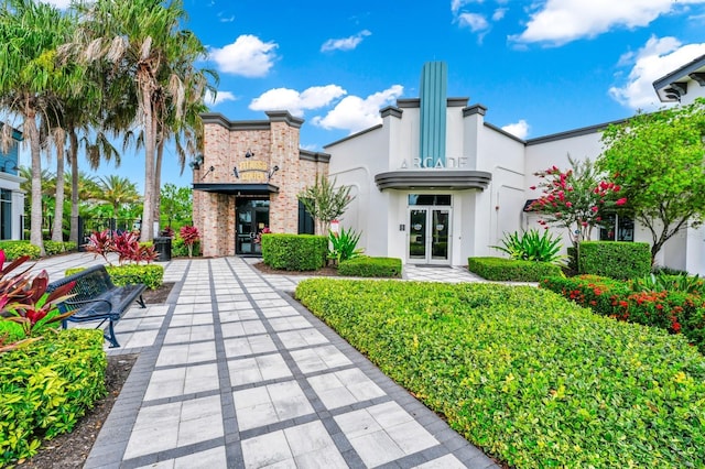 652 Benoi Dr, Davenport, FL 33896 - view of front of property with stucco siding and french doors
