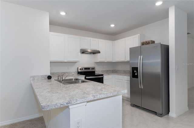1267 Berry Ln, Davenport, FL 33837 - kitchen featuring appliances with stainless steel finishes, under cabinet range hood, a sink, light countertops, and a peninsula