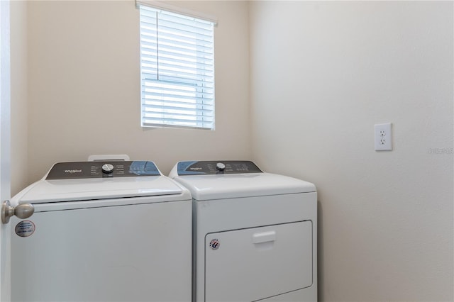 1267 Berry Ln, Davenport, FL 33837 - washroom with separate washer and dryer
