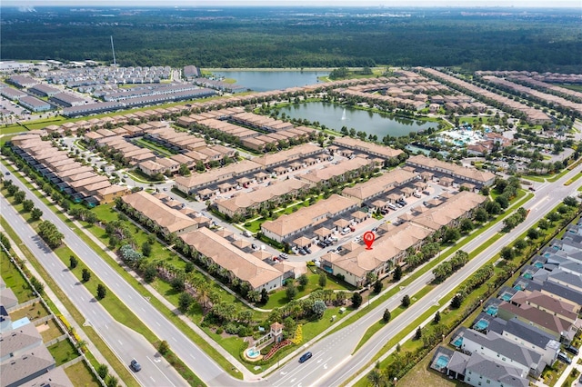 1979 Majorca Dr, Kissimmee, FL 34747 - view of property location featuring a nearby body of water, nearby suburban area, and a heavily wooded area