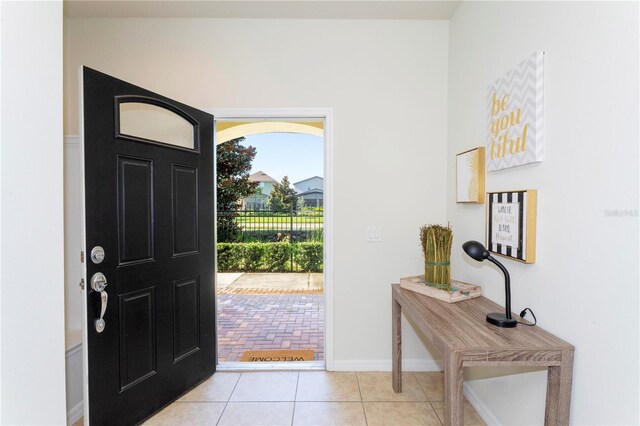 1979 Majorca Dr, Kissimmee, FL 34747 - entrance foyer featuring light tile patterned floors and baseboards