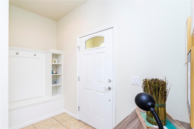 1979 Majorca Dr, Kissimmee, FL 34747 - mudroom featuring light tile patterned floors