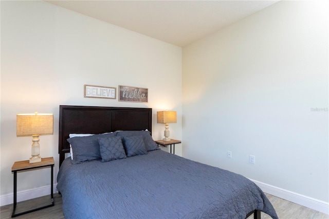 1979 Majorca Dr, Kissimmee, FL 34747 - bedroom featuring wood finished floors and baseboards