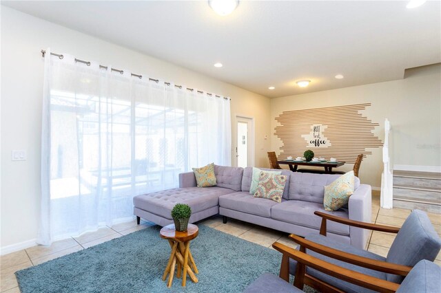 1979 Majorca Dr, Kissimmee, FL 34747 - living room featuring light tile patterned flooring, stairs, baseboards, and recessed lighting