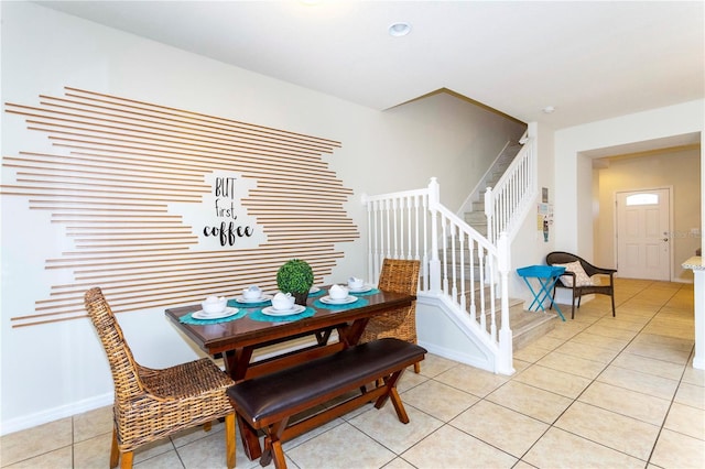 1979 Majorca Dr, Kissimmee, FL 34747 - dining area with stairs and light tile patterned flooring