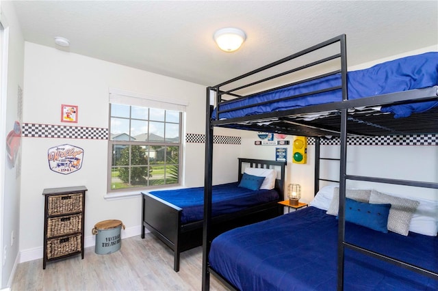 1979 Majorca Dr, Kissimmee, FL 34747 - bedroom featuring wood finished floors and baseboards