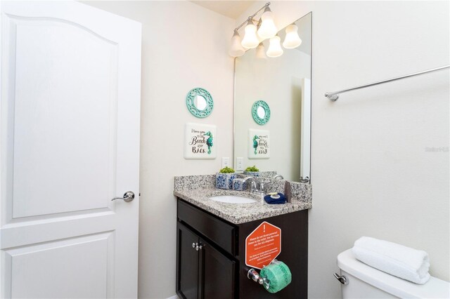 1979 Majorca Dr, Kissimmee, FL 34747 - half bath featuring vanity and toilet
