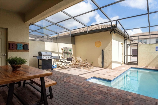 1979 Majorca Dr, Kissimmee, FL 34747 - outdoor pool with area for grilling, a patio area, outdoor dining area, and glass enclosure