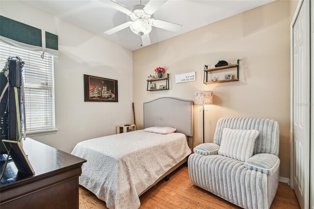 404 Sotheby Way, Debary, FL 32713 - bedroom featuring wood finished floors, a closet, and ceiling fan