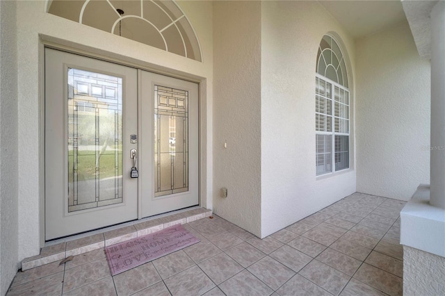 10955 Lemay Dr, Clermont, FL 34711 - doorway to property featuring french doors and stucco siding